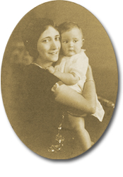 Howard Gilman as a child held by his mother.